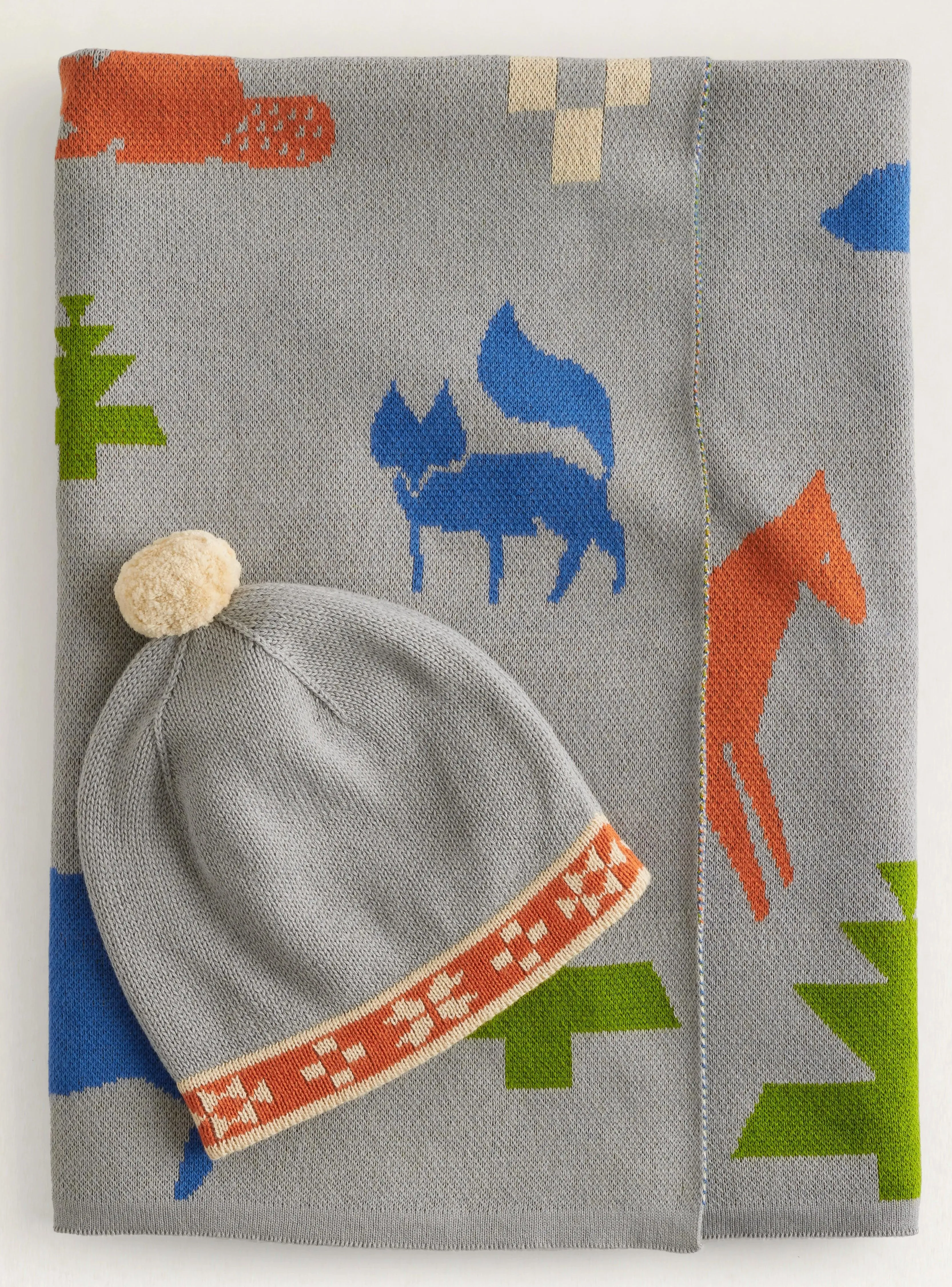 Shared Path Baby Blanket & Beanie bookcase, standing shelf
